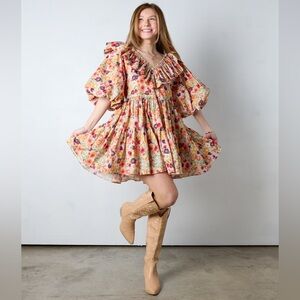 Vestique Pascal dress in orange floral. Size medium.